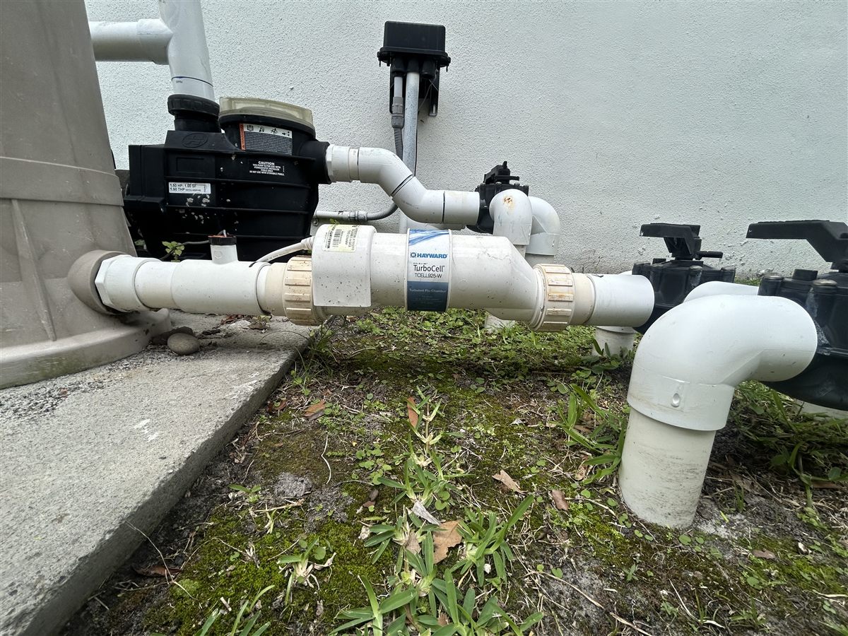 Example close-up photo of a salt chlorine generator cell on pool plumbing